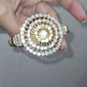 Yellow gold tone flower bracelet